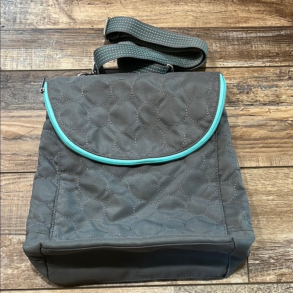 Gray Quilted Crossbody Thirty-one Bag with Teal Trim.
